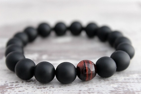 ManAndStone's tweet photo. Unique Son Bracelet Son https://t.co/vzLLZuBEeT via @EtsySocial #etsygifts #etsyfinds #tigerseyebracelet #redtigerseye https://t.co/IFlFEZyvMq