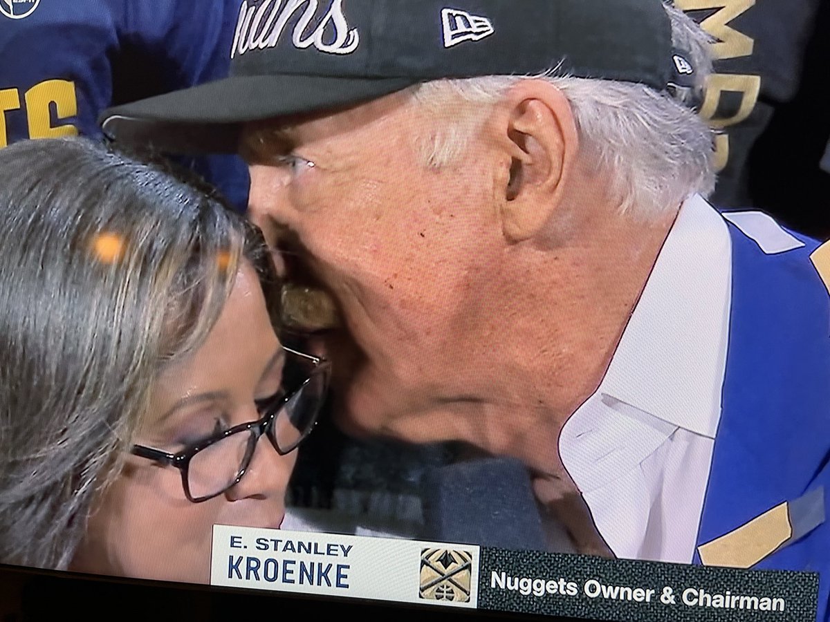 ClemDuper's tweet photo. Stan Kroenke loves double breasted suits and doesn’t understand how microphones work. #Nuggets https://t.co/VC4QbjO9dK