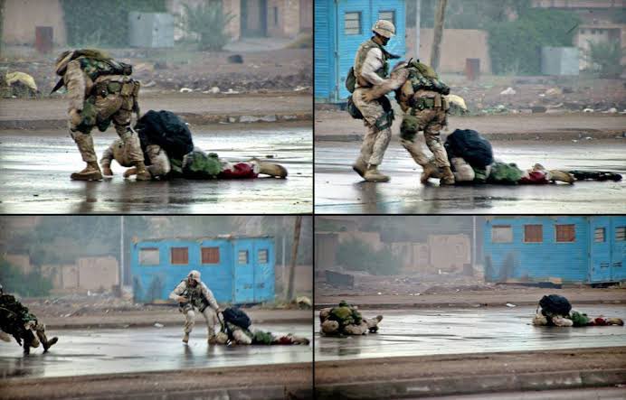 optama's tweet photo. "Without hesitation, Gunnery Sgt. Ryan Shane dashed out into the line of fire.
He ran to the fatally wounded Marine, grabbed his collar, &amp; attempted to pull him to safety. But the enemy was unrelenting, &amp; within seconds,
Shane spun to the ground.”

That almost took Ryan’s life. https://t.co/vyW3EgTb4d