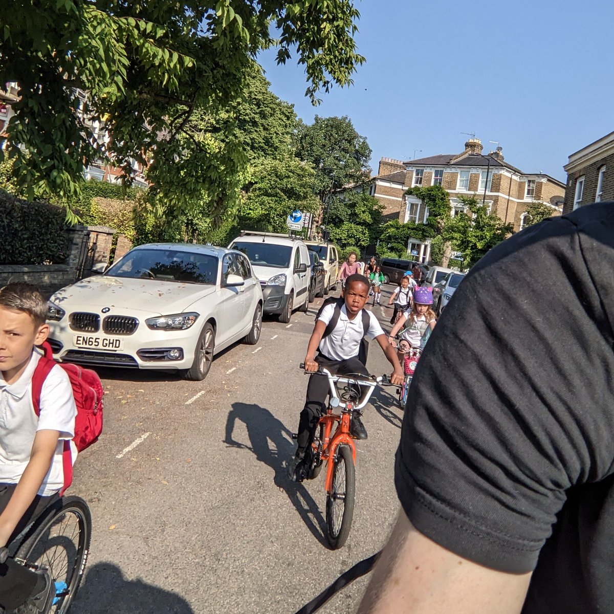 A quick over-the-shoulder shot of our @primary_orchard #bikebus this morning. The route takes us on a lovely cycle ride through Well Street Common and around St John's Church #Hackney. A great way to start the day!