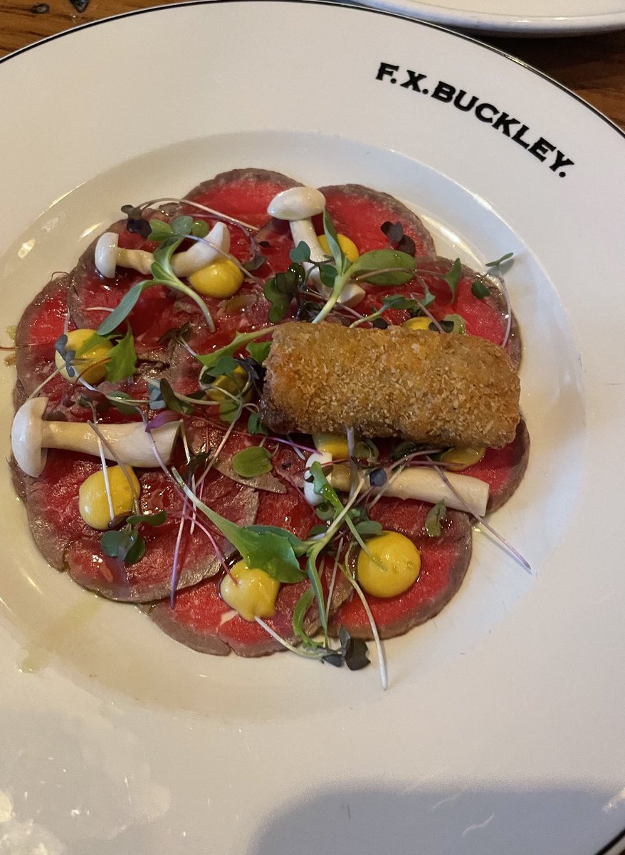 Carpaccio of beef fillet with bone marrow croquette pickled mushrooms squash purée and micro cress 👌