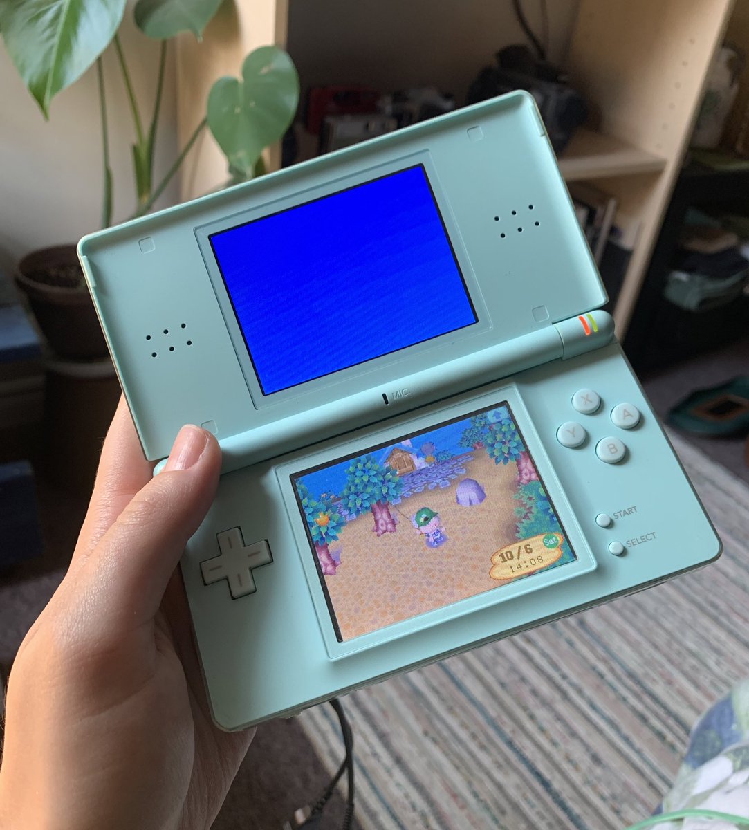 boyshouts_'s tweet photo. Mentioned to my brother I wanted to play more video games and he just GAVE me this DS that we got from our grandparents like, 15 years ago?? Incredible, can’t wait to finally enter my Animal Crossing (2005) era 🍃 https://t.co/cMOBU6BYI6