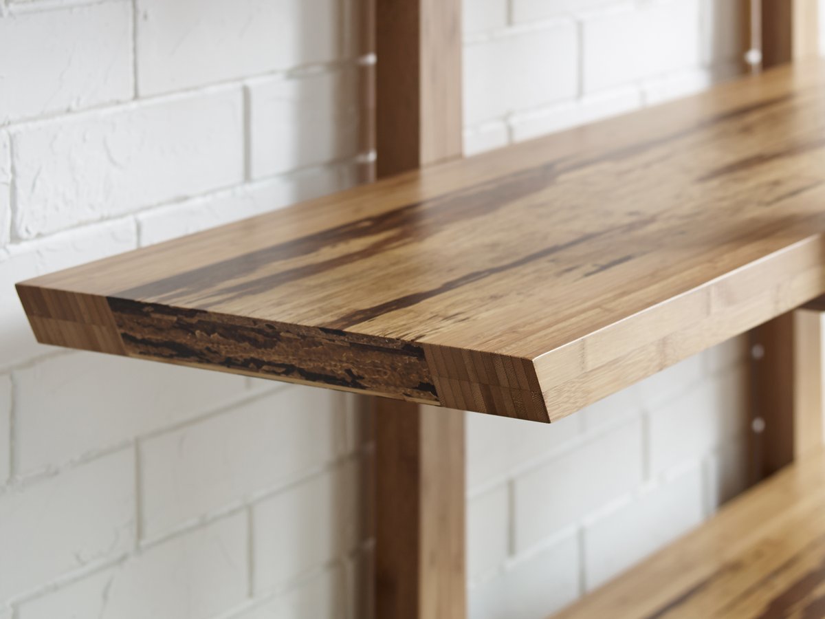 See the edge detail of our Magnolia Shelf, revealing the richness of dense exotic Tiger bamboo. Exotic Tiger combines light and dark bamboo material, creating a unique striped grain pattern!

greenington.com

#livegreenington #sustainablefurniture #modern #bamboo