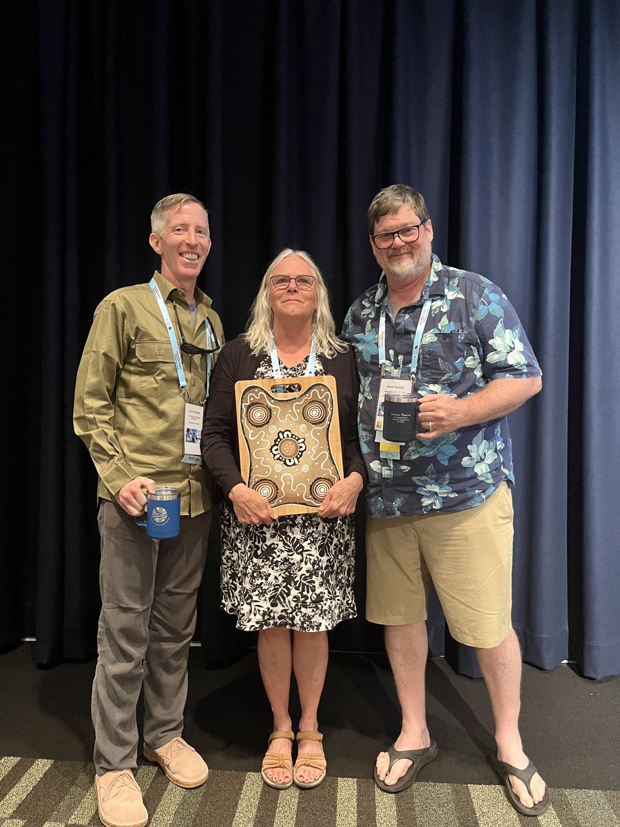 The traditional "passing of the mug" at #2023SFS/#FreshwaterDownUnder marked the transition of society leadership from Steve Thomas (Past President) &amp; @JohnKominoski (Past Vice President) to Sherri Johnson (President) &amp; <a href="/FluvialBenthos/">Erin Hotchkiss</a> (Vice President) - thanks for your service!