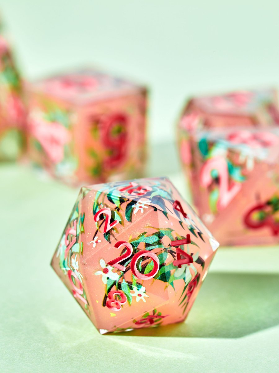 The garden had grown wild, entwined around the cottage as if sheltering it from the outside world.
Overgrowth is a 7-Piece Iconic Dice Set from the✨ Witch's Apothecary ✨drop, available on 6/29.

Get early access: ow.ly/vf0h50OLv7T