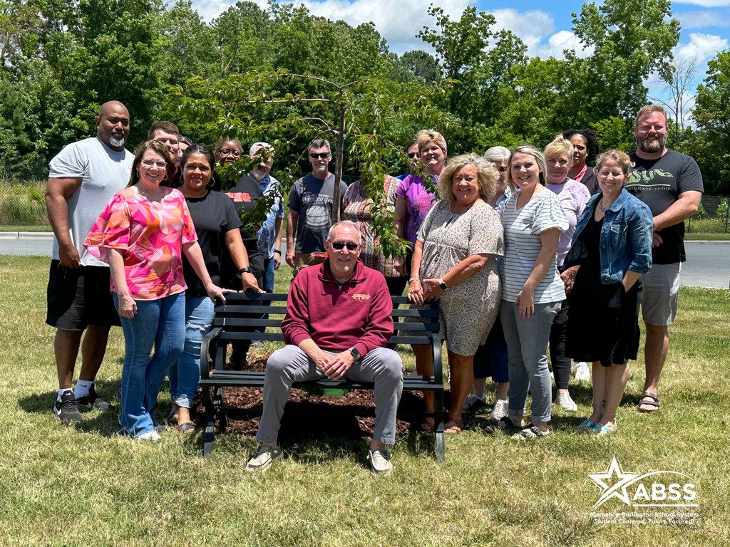 CTEC staff planted a weeping cherry tree to honor Principal Dr. Jay "Darrell" Thomas for his exceptional leadership, deep care for students, and unwavering commitment to education over a span of 36 years, beginning in 1987.
