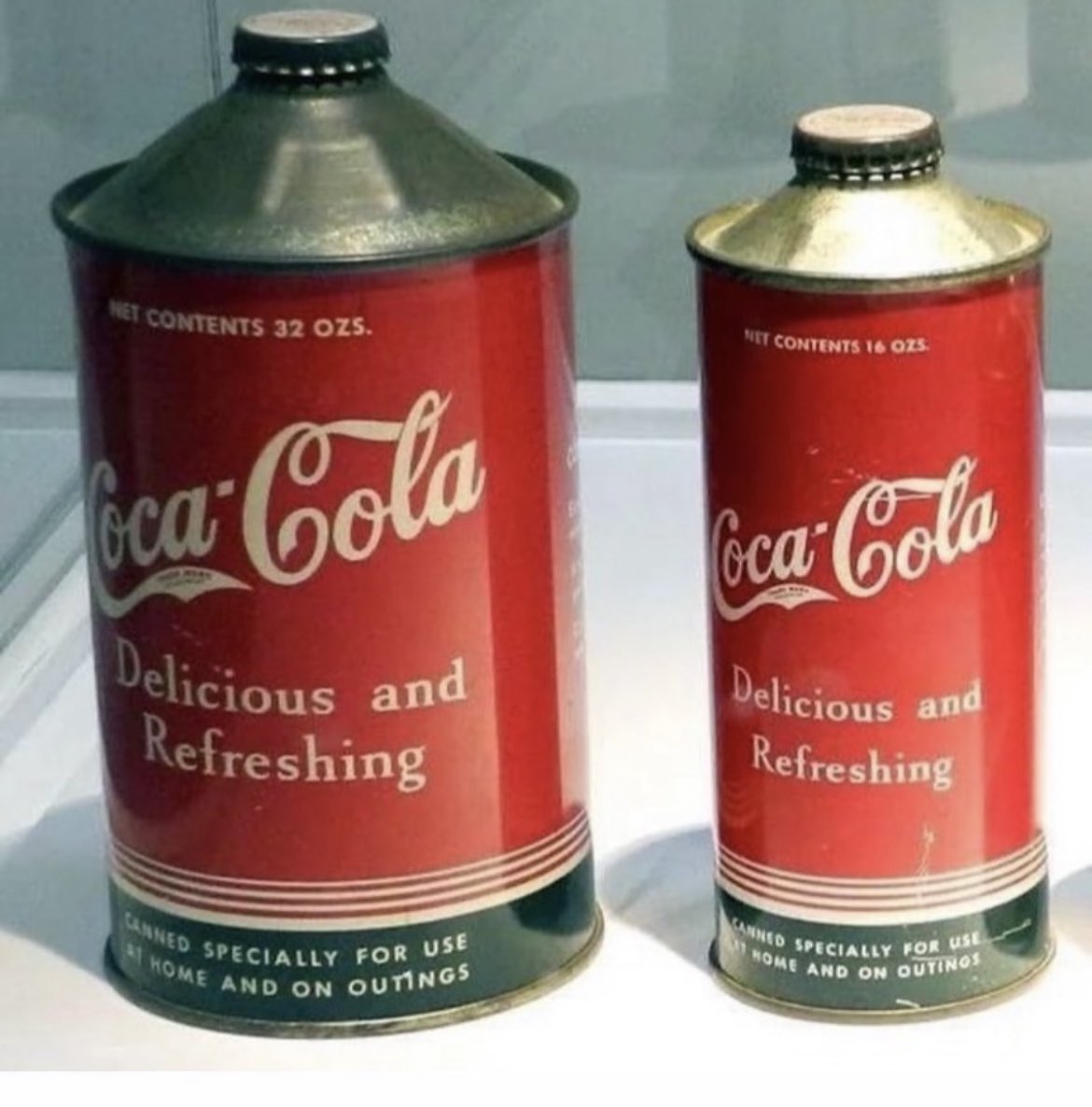 This photograph showcases Coca-Cola cans dating back to the 1930s. The Coca-Cola Company, established in 1886, can be attributed to John Stith Pemberton, a pharmacist hailing from Columbus, Georgia. Pemberton's initial intent behind inventing Coca-Cola was to create a medicinal…
