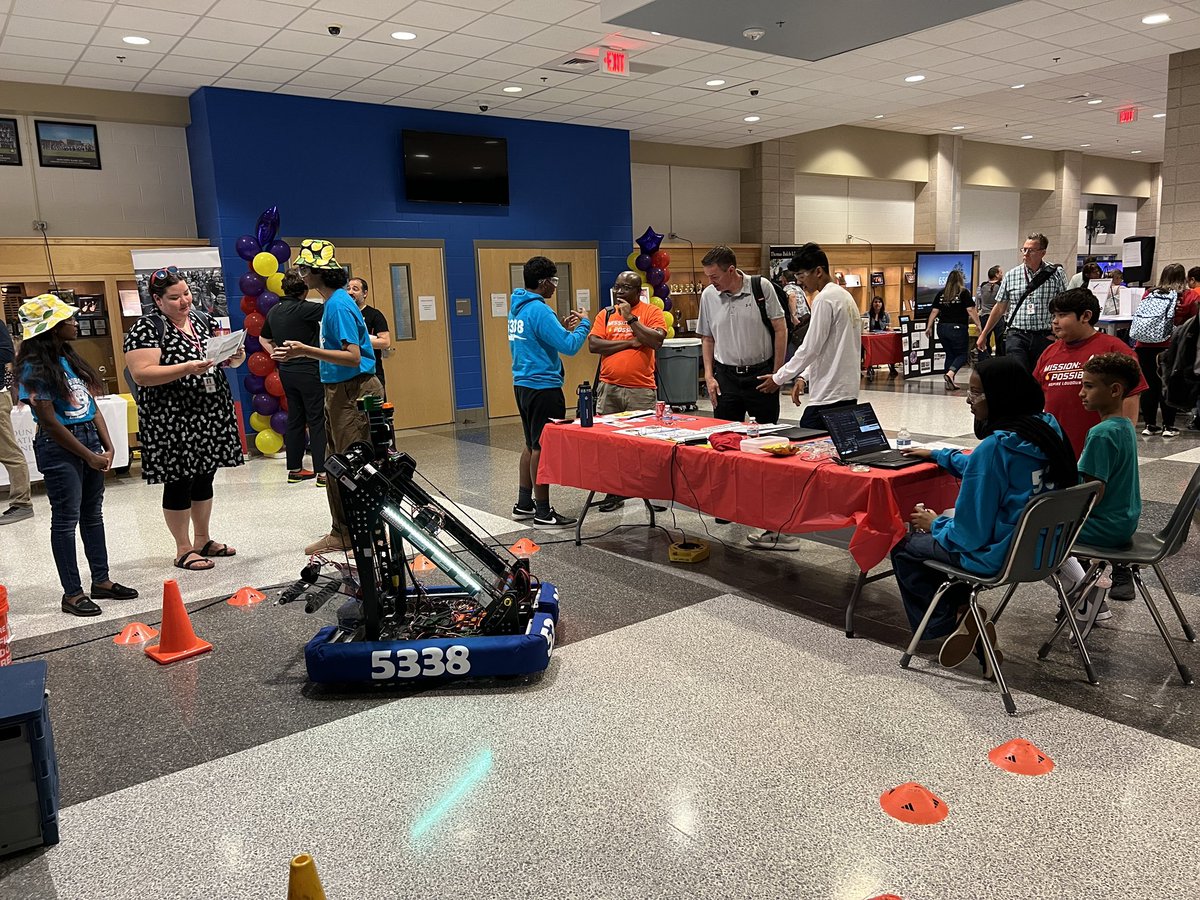 Academies of Loudoun RoboLoCo at #INSPIRELOUDOUN23 showcasing our FRC robot Raptor Rivets. Talking STEM &amp; competition robotics to LCPS staff. Elementary student presenters behind the controllers. <a href="/LCPS_Academies/">Academies of Loudoun</a>