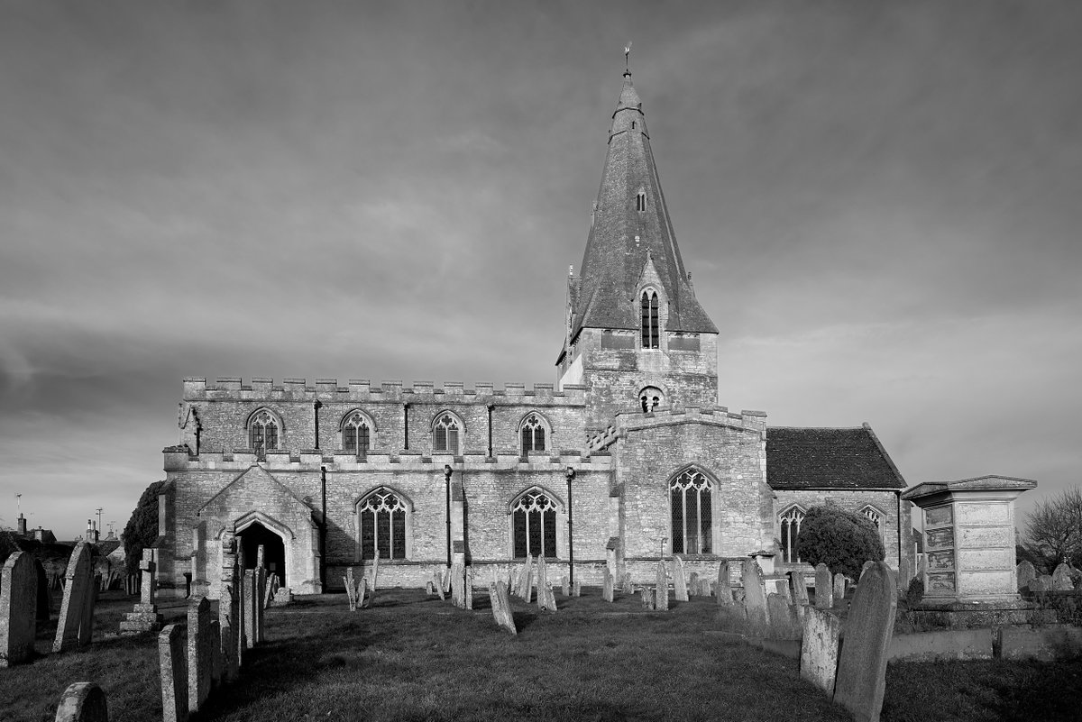 Northamptonshire Parish Church. #church #englishchurch #village #englishvillage #medieval #medievalarchitecture #spire #northamptonshire #leica #leicaq2 #monochrome #blackandwhitephotography