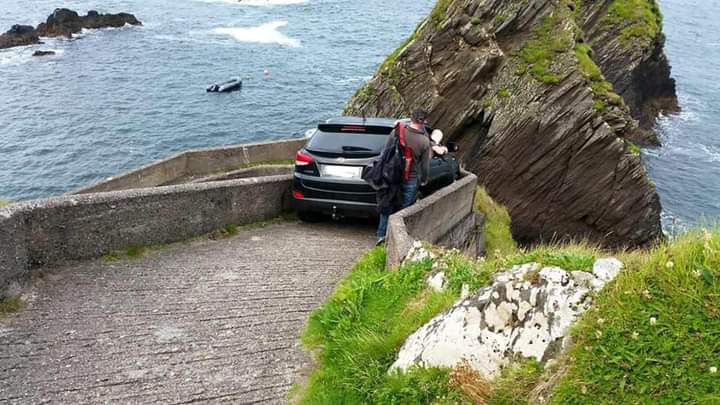 Two black SUV drivers who saw the No Entry signs at Dunquin saying 'Route for Pedestrians & Sheep only' & decided it didn't apply to them, one burnt out their clutch trying to reverse up before getting rescued by tractor 😆

@Wankpanzer