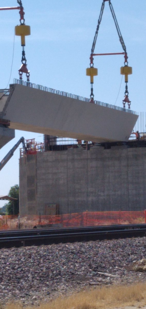 Anthony22489554's tweet photo. I got to watch a section of a overpass get set into place. I forgot the exact weight but that crane picked it up easily. #BigBuilds https://t.co/z2A2bbPfEj