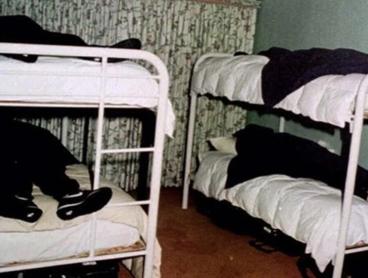 A picture showing the bodies of dead cult members who died believing their souls were going on a spaceship, which would take them into an alien world in 1997. Heaven's Gate was a Christian cult led by Marshall Applewhite. The cult became infamous in 1997 after 39 members