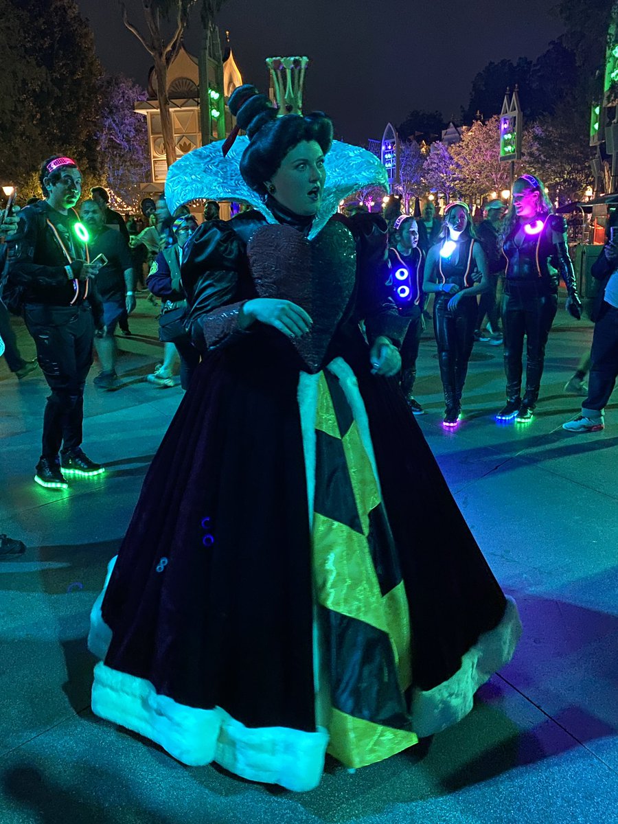 The Queen of Hearts is out interacting with guests in Fantasyland as a face character. #DisneylandAfterDark #PrideNite #Disneyland