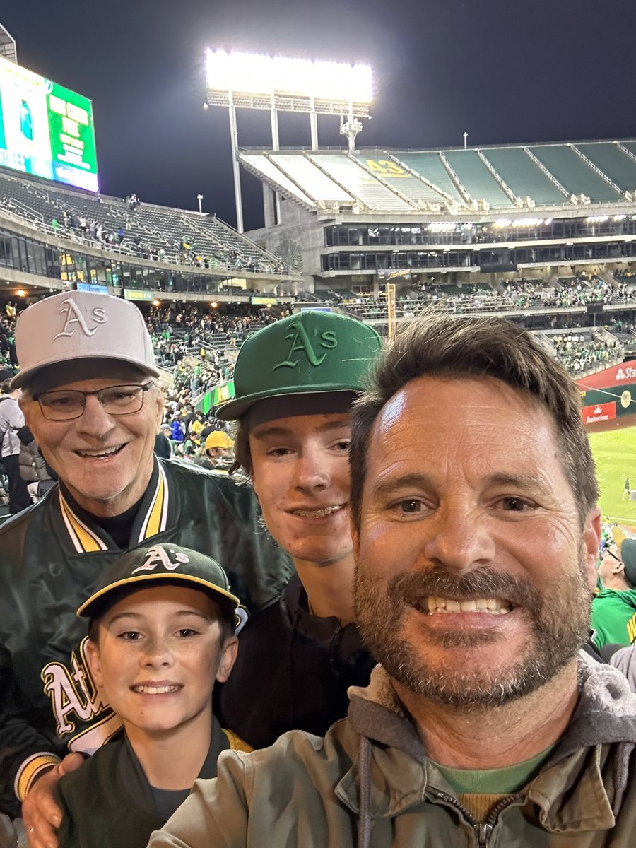 GreenGoldWeekly's tweet photo. One of the most epic nights of A’s baseball in my 40 years of fandom…alongside my sons and Dad. This is what Fisher is scheming to rob us of…generations coming together in the East Bay to make memories. #OaklandAthletics #OAKtogether #SellTheTeam https://t.co/U9RDUCFxot