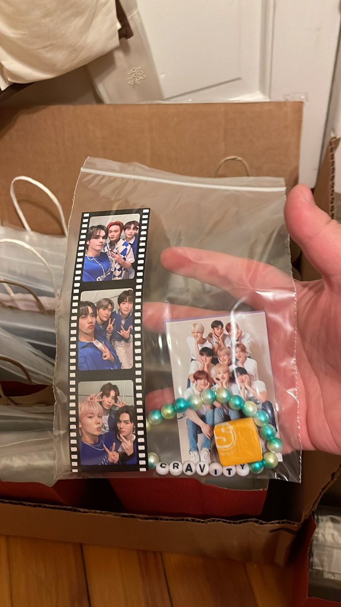 cravity nyc freebies all done!! i have little baggies for cravity + each member !! 
nyc luvity come find me on friday !!

(each baggie includes a film strip, print, bracelet, and starburst, plus a little enjoy the concert note!)