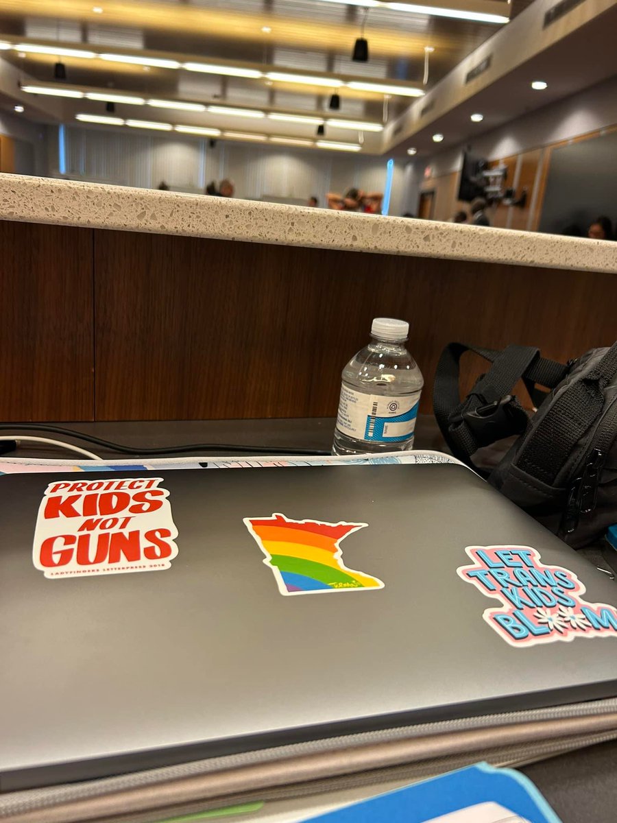 My view from the dais on this last school board meeting of the school year, along with new stickers for my district laptop. #Pride2023 #ProtectKidsNotGuns