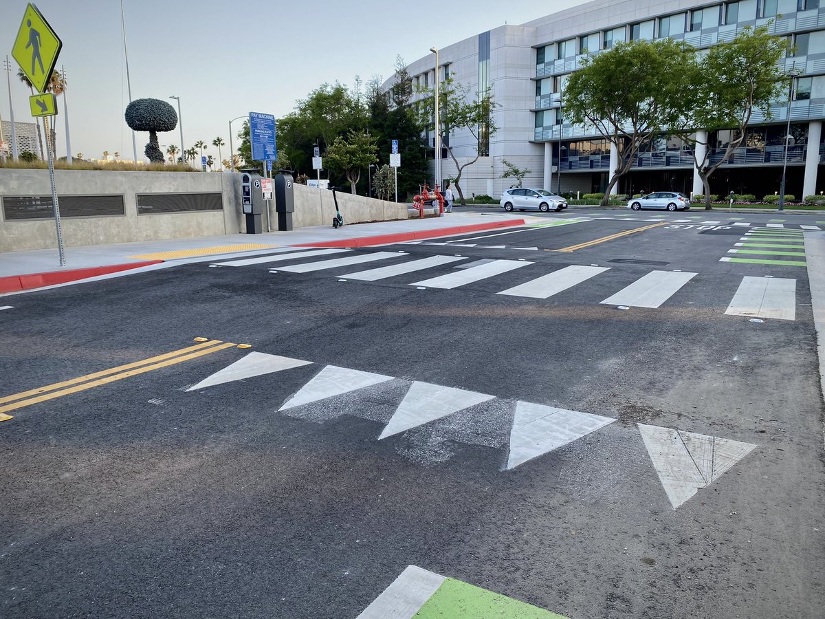 Please give these metal bollards and raised crosswalk a standing ovation.
And then go ask for more.