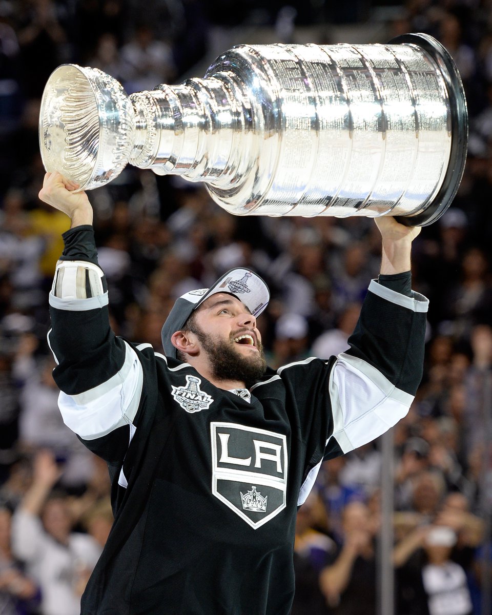 NHL's tweet photo. Exactly nine years later TO THE DAY, Alec Martinez (@amartinez_27) and Jonathan Quick hoist the #StanleyCup once again. 🏆 https://t.co/Y3mnlBYsle