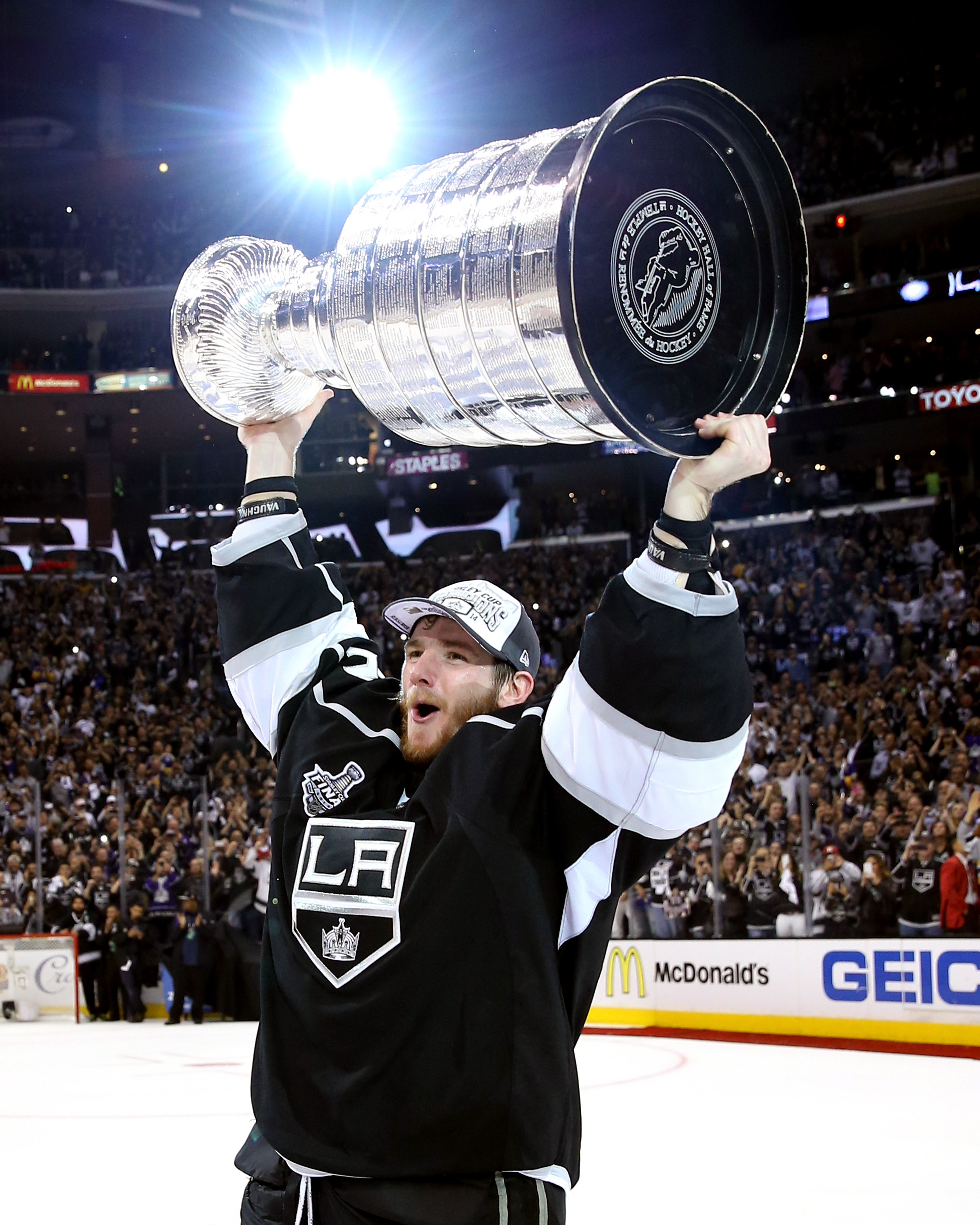 Jonathan Quick #32 and Alec Martinez #27 of the Los Angeles Kings celebrate  their win against the Colorado Ava…