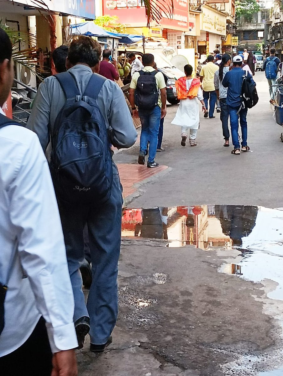We bring to your notice a gutter which is overflowing just with this seasons first shower. Location: outside Bank of India, D. N. Road, Fort. Thousands of people walk through this part of the road and hence immediate action is requested.