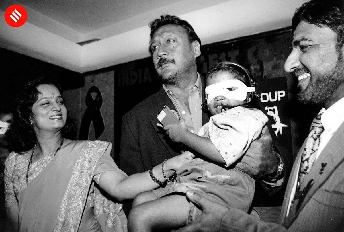 Social activist Smita Thackeray, actor Jackie Shroff, and Dr. IS Gilada with an HIV-positive child at a press meet to announce a concert for AIDS victims in Mumbai.

Express photo by Mahendra Parikh.

#ExpressArchives