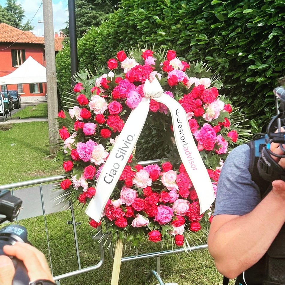 Prostitute 'review' website Escort Advisor lays a wreath in front of Silvio Berlusconi's villa June 14, 2023