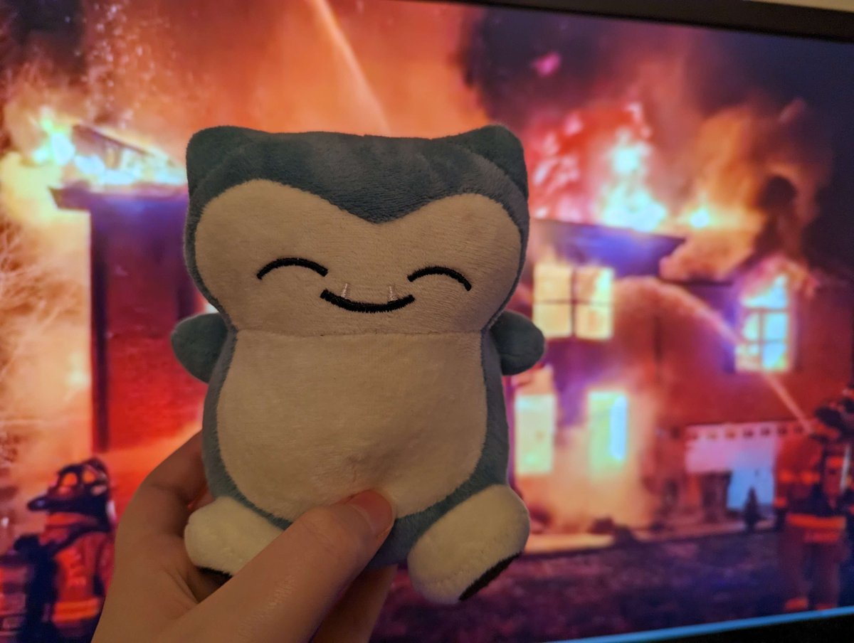 me and my snorlax plushie watching yotube :D