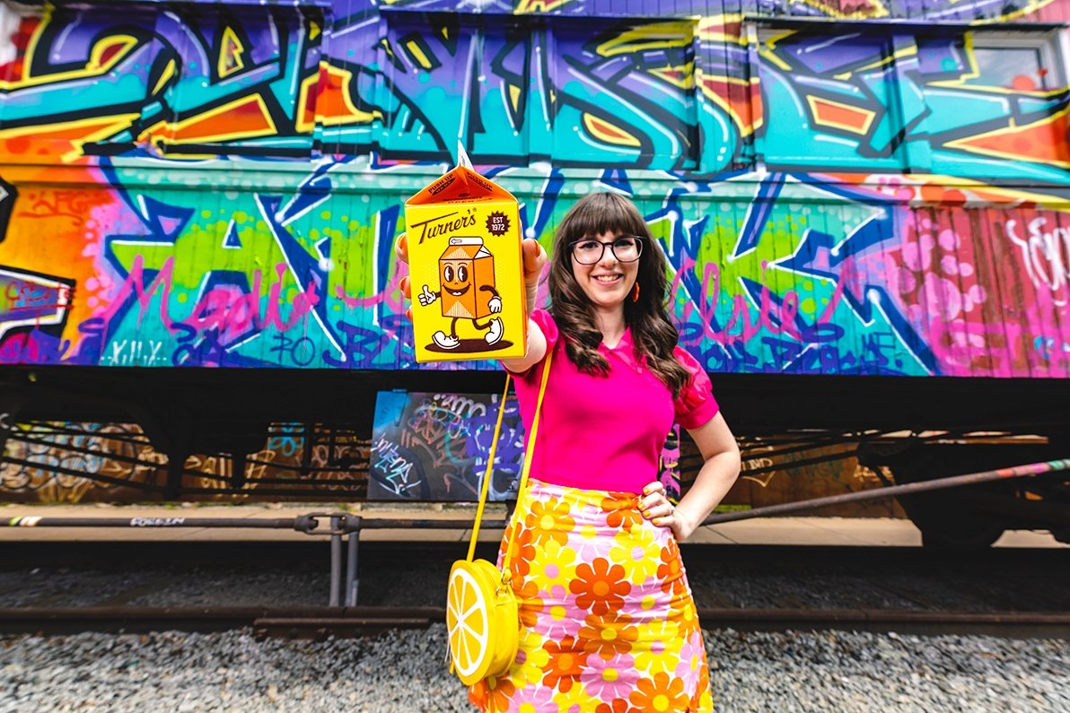 turnerspgh's tweet photo. New cARTons who dis? 

Meet this year's winner of the cARTon contest, Julia Mattern 🤗 

Have yinz spotted the new design in stores yet? 👀
#FueledByTurners https://t.co/oezSsVlmiw