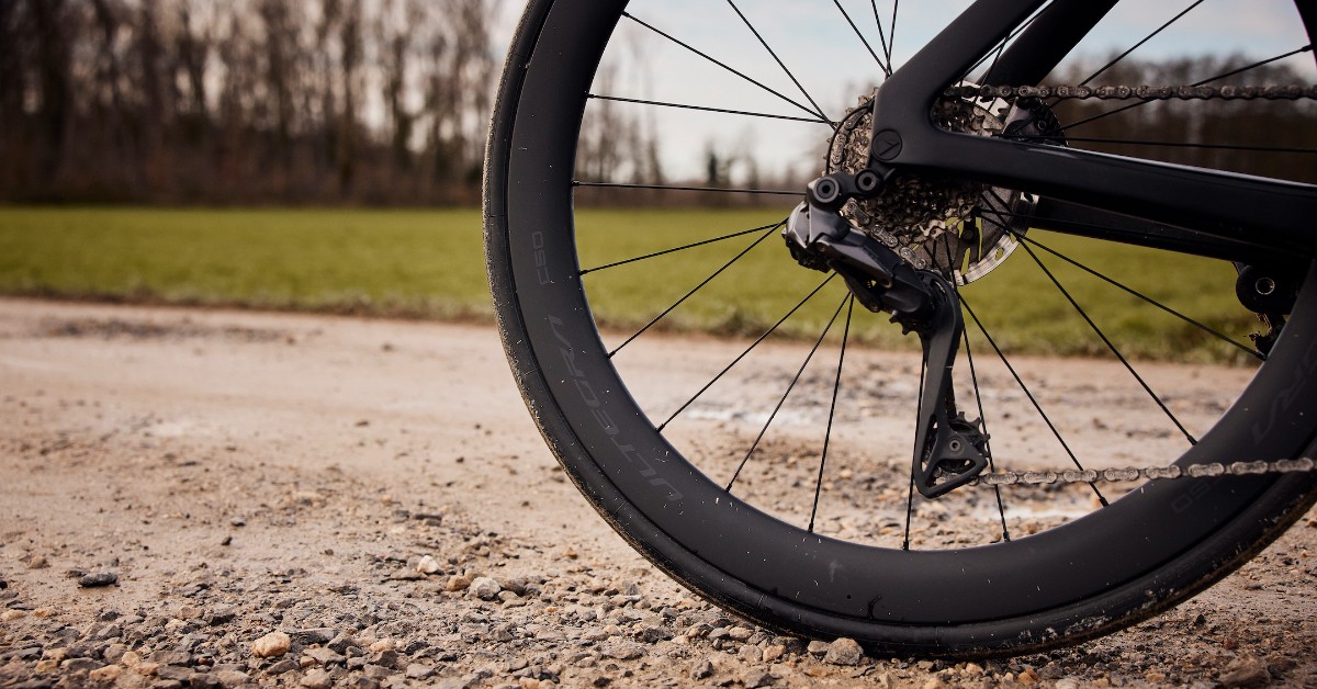 Gravel on a road bike? Why not? Just make sure you ride aero wheels built to take on some real-world groads, like our ULTEGRA C50s. #ShimanoRoad