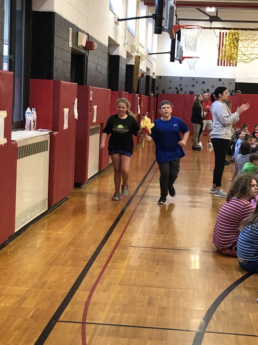 EBHSchool's tweet photo. #ebhschool. 4th grade Olympics are happening now!   Moved inside but still a great time.  Torch bearers got things started https://t.co/XFMMyoRaml