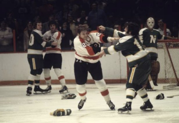 Andre Dupont of the Philadelphia Flyers fights Jean-Paul Parise of the Minnesota North Stars during a hockey game on March 23, 1973 at Philadelphia. #AndreDupont #Philadelphia #Flyers #PhiladelphiaFlyers #JeanPaulParise #MinnesotaNorthStars #Minnesota #hockey #NorthStars #1970s
