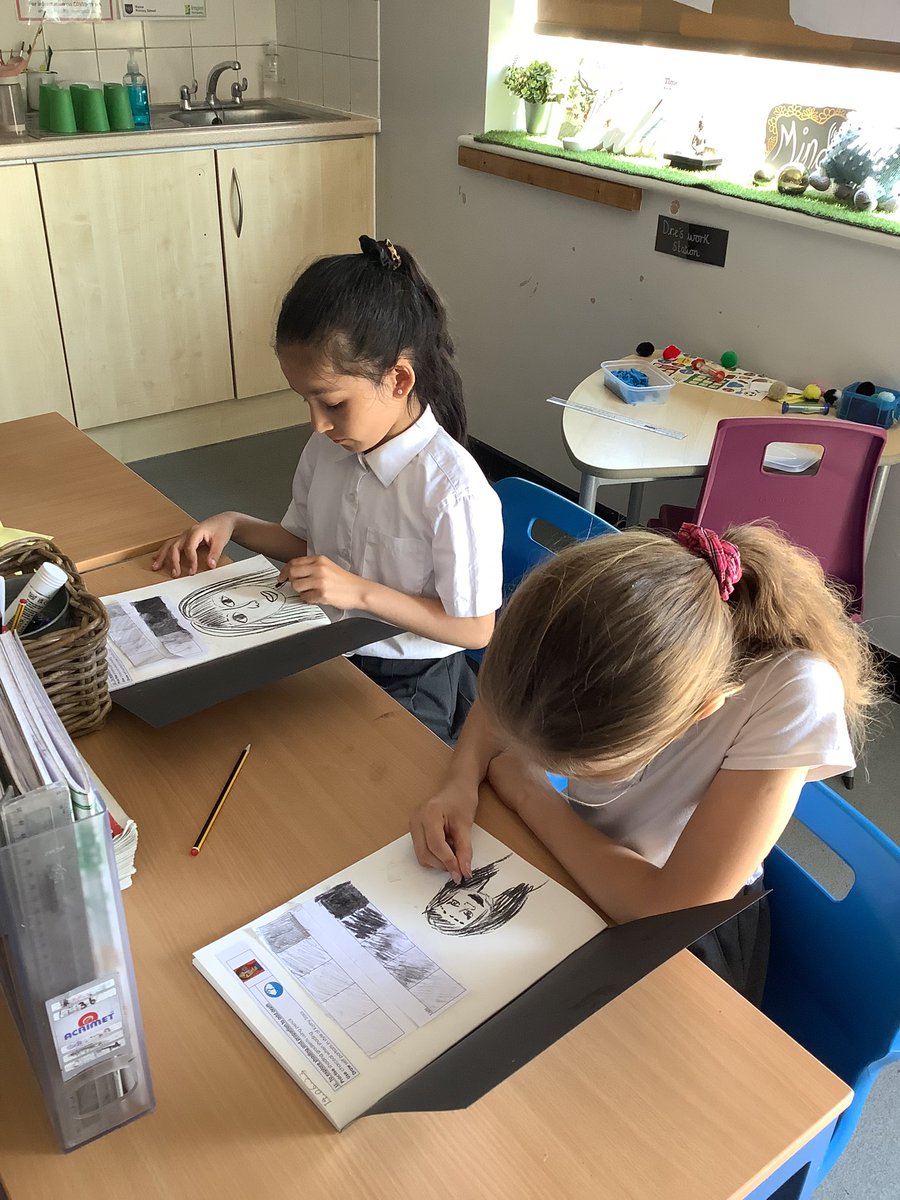 MissKaursclass's tweet photo. Today we enjoyed exploring shading and proportion to add depth! We started off using charcoal to practise shading gradients, then we drew a self portrait in the style of our Artist: Kathy Sosa. We are very proud of our work! @PrimaryElaine https://t.co/VwYwxQY161