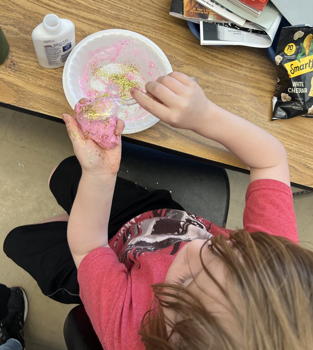 Student making slime during <a href="/THESThunderbird/">Travis Heights Elementary School</a> Summer Camp #STEMeducation