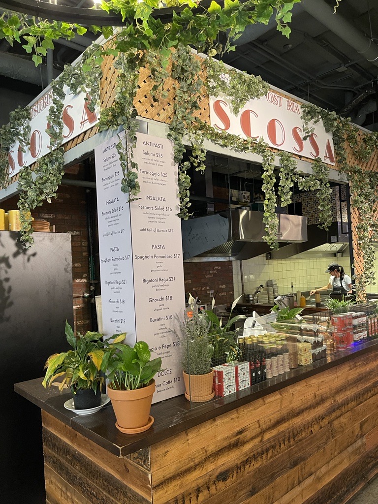 📷 Explore the captivating point-of-sale of Scossa! Feast your eyes on their delightful menu, nestled on a rustic wooden countertop amidst lush greenery. Savor the flavors while surrounded by nature's embrace. #RestaurantInspo #RestaurantMenus #Menus #Print