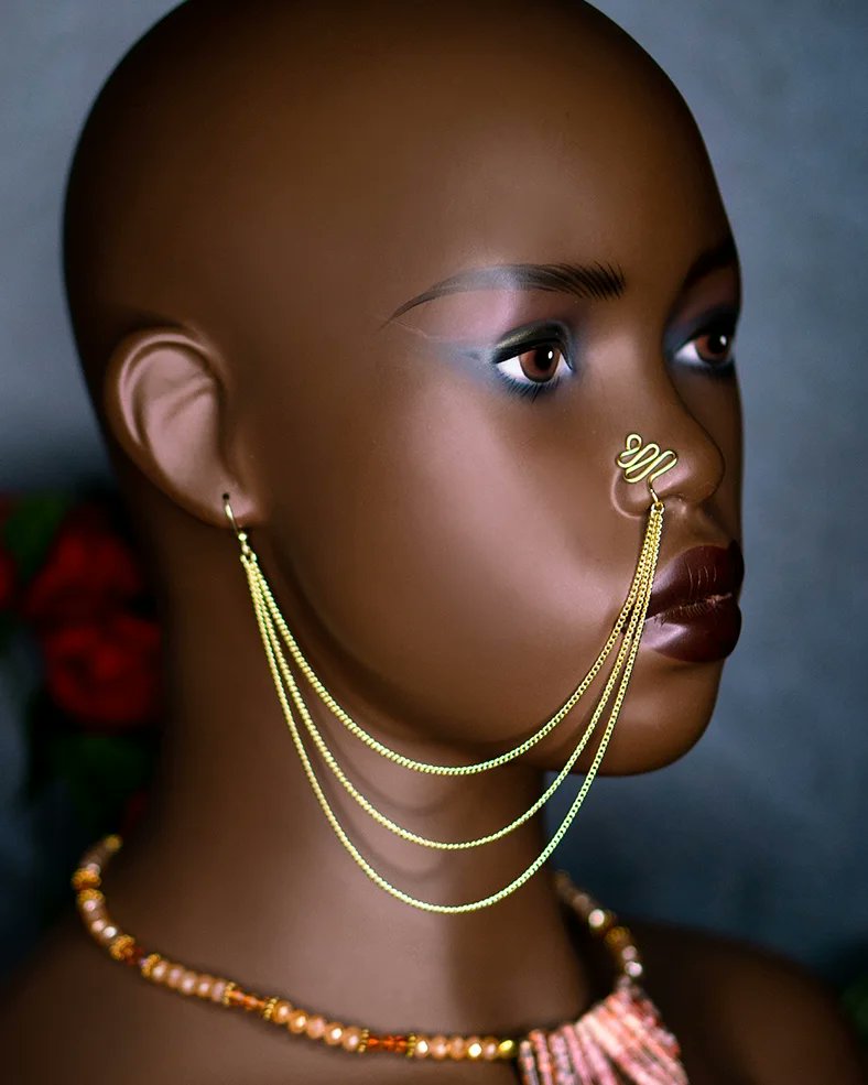 adornedintaji's tweet photo. The Nzuri Nose Chain has been restocked (limited quantity)! How are you showing up this Summer? 😍 • Nzuri Nose Chain $37 (includes shipping). Does not require a Nose piercing, it has a Cuff. ✨️ #handmadejewelry #blackowned #nosechain #nosechaintribe #fauxnosering #nosecuff https://t.co/PZTgC1wcw7