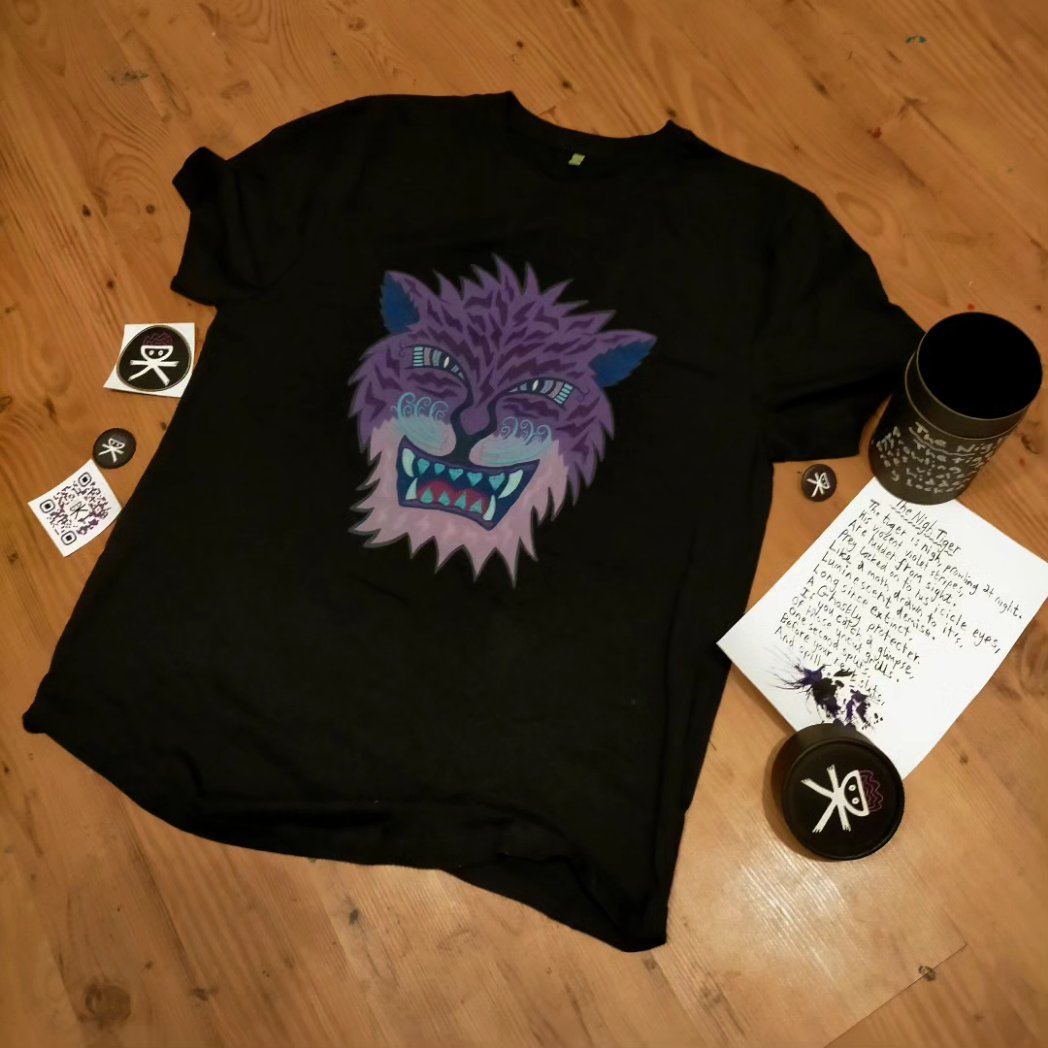 deathimself13's tweet photo. Awesome T-shirt care package just arrived from @linedrawnlust 
Already wearing the TEMBD vest and found a home for the stickers. Loved the customized tube packaging for the Night Tiger tee and poem! Many thanks! https://t.co/kBs41NbwsW