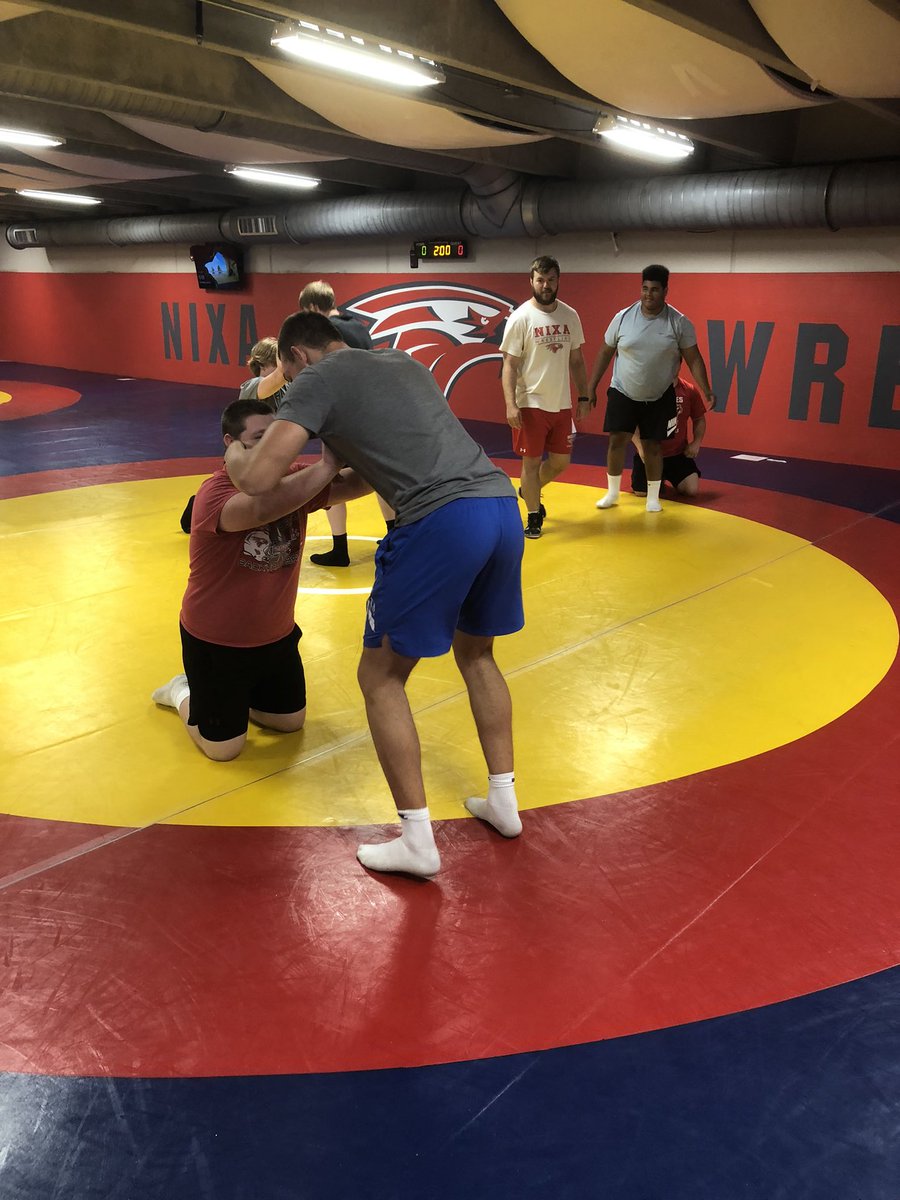 CoachMedley66's tweet photo. Little different post film work today for Nixa Trench Gang. Thanks @benmelton44 for taking us through some body position and leverage work in the wrestling room! #TeamNixa https://t.co/bZgosHJly1