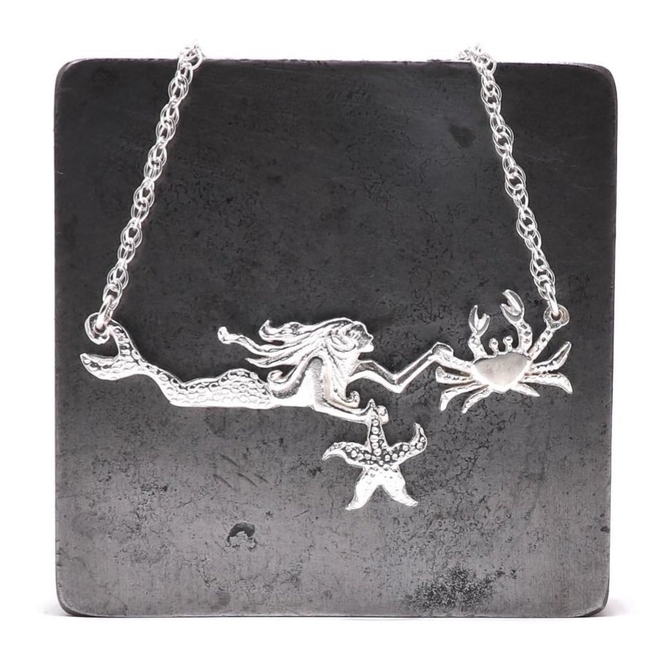 Sterling Silver Mermaid, Crab & Starfish Necklace Design on Rope Chain by Sarah Weatherall. Dreaming of a cool swim in the sea on such a hot day #contemporaryjewellry #sterlingsilver #necklace #mermaid