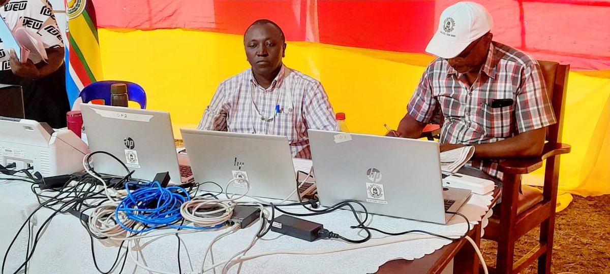UgandaEC's tweet photo. The Returning Officer Bukedea District, Mugyeni Joel is receiving results from the field as they progressively come in at the gazetted District Tally Center, Bukedea Town Council.
#BukedeaByElection
@PaulBukenya https://t.co/srtBQgl0fR