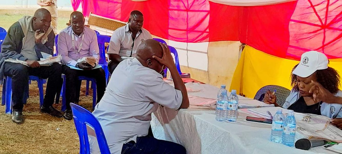 UgandaEC's tweet photo. The Returning Officer Bukedea District, Mugyeni Joel is receiving results from the field as they progressively come in at the gazetted District Tally Center, Bukedea Town Council.
#BukedeaByElection
@PaulBukenya https://t.co/srtBQgl0fR