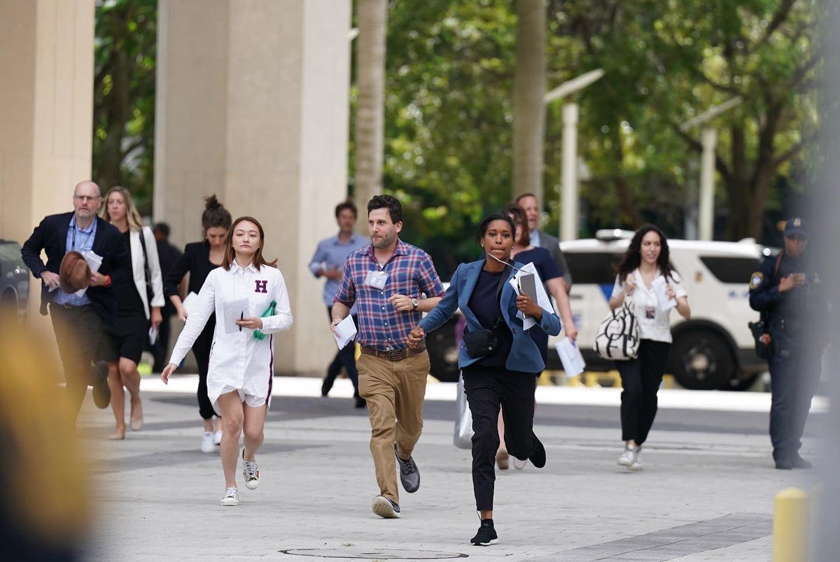 rachelvscott's tweet image. Cameras capturing the moment we were let out of the courtroom where Former President Donald Trump was arraigned.
  
No cameras allowed inside— a small group of journalists witnessed a moment unlike any other in American history &amp;amp; raced to report out the details
