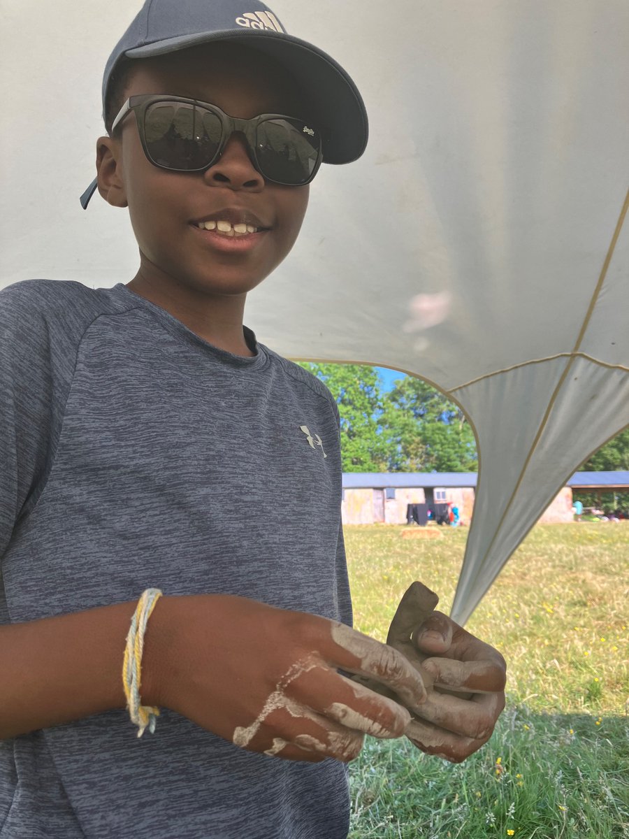 Young Leader Lewis making clay models