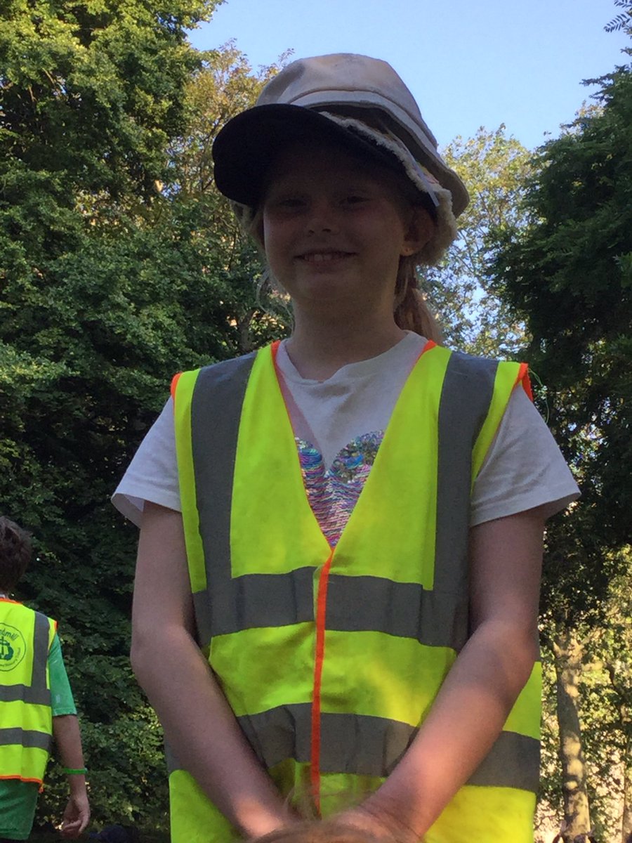 Relaxing on the grass. Hat collecting, massaging and hairdressing