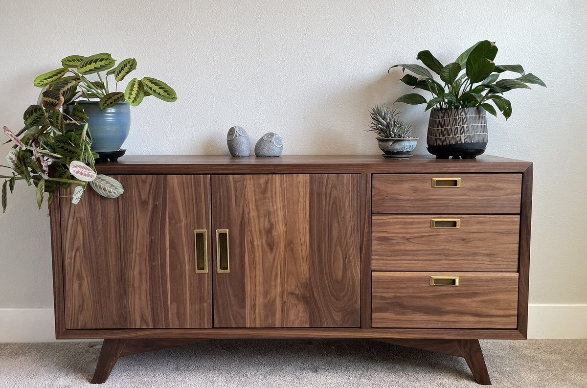 My partner Ryan (whom I am marrying next week ❤️) wisely stays off social media, so allow me to be his temporary avatar. He’s been teaching himself woodworking. This is the first piece of furniture he’s built with his own hands: a walnut credenza in midcentury modern style 😍