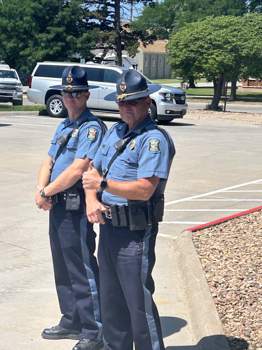 Thank you ⁦<a href="/GovLauraKelly/">Governor Laura Kelly</a>⁩ and KHP Officers Phillips and Wright for stopping by Trego Grade School and Supporting our Summer Lunch Program at USD 208 #tregoeagles #begolden