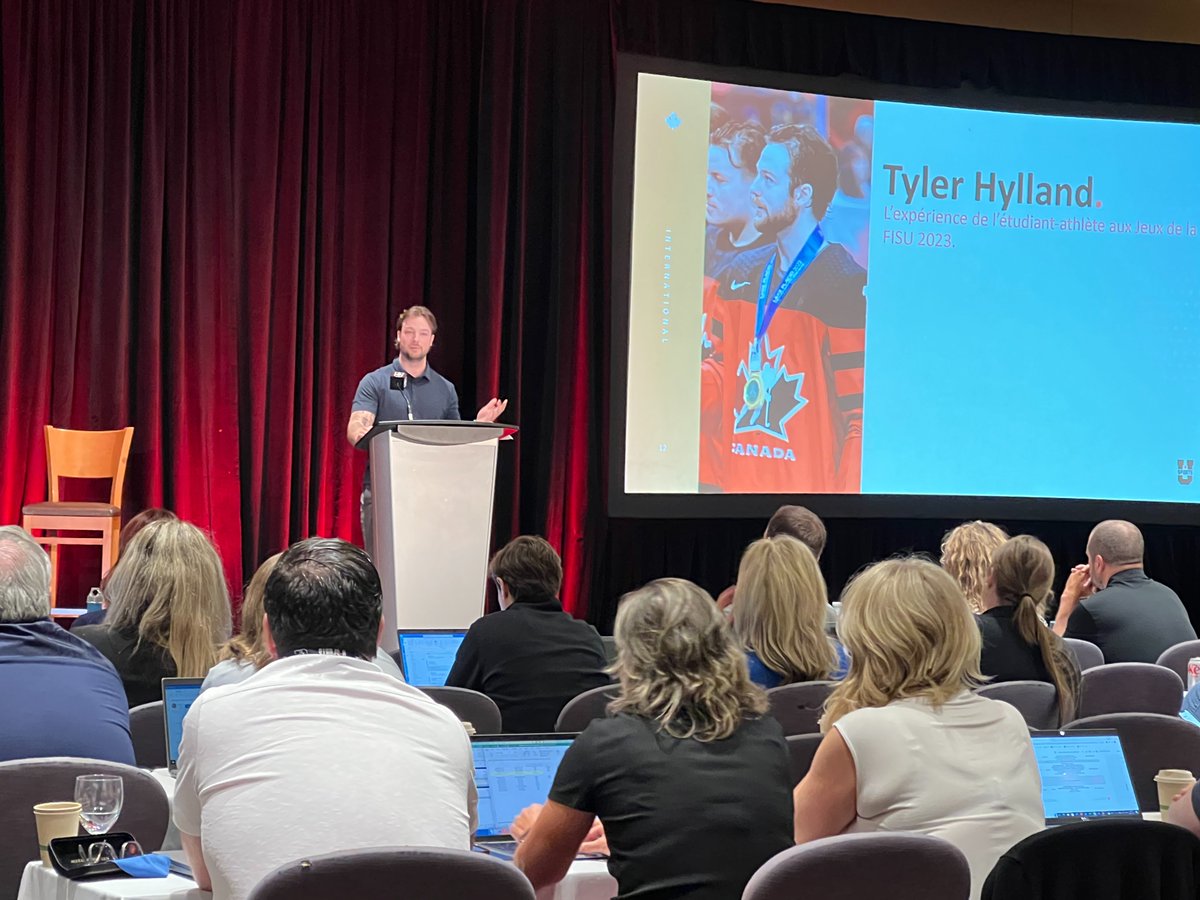 USPORTSIntl's tweet photo. Tyler Hylland of  @The_Stingers played a pivotal role in capturing gold at the 2023 Lake Placid World University Games for Team Canada. 🇨🇦 

Today he was a keynote speaker at the U SPORTS AGM and discussed his story and the student-athlete experience of a @FISU competition. https://t.co/j2hImgA9XR