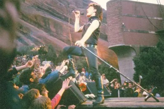 @ThatEricAlper U2 Live at Redrocks 1983 
Reasons 
1. It’s epic 
2. That version of Sunday Bloody Sunday (with flag)
3. The mullett!!! 
#U2