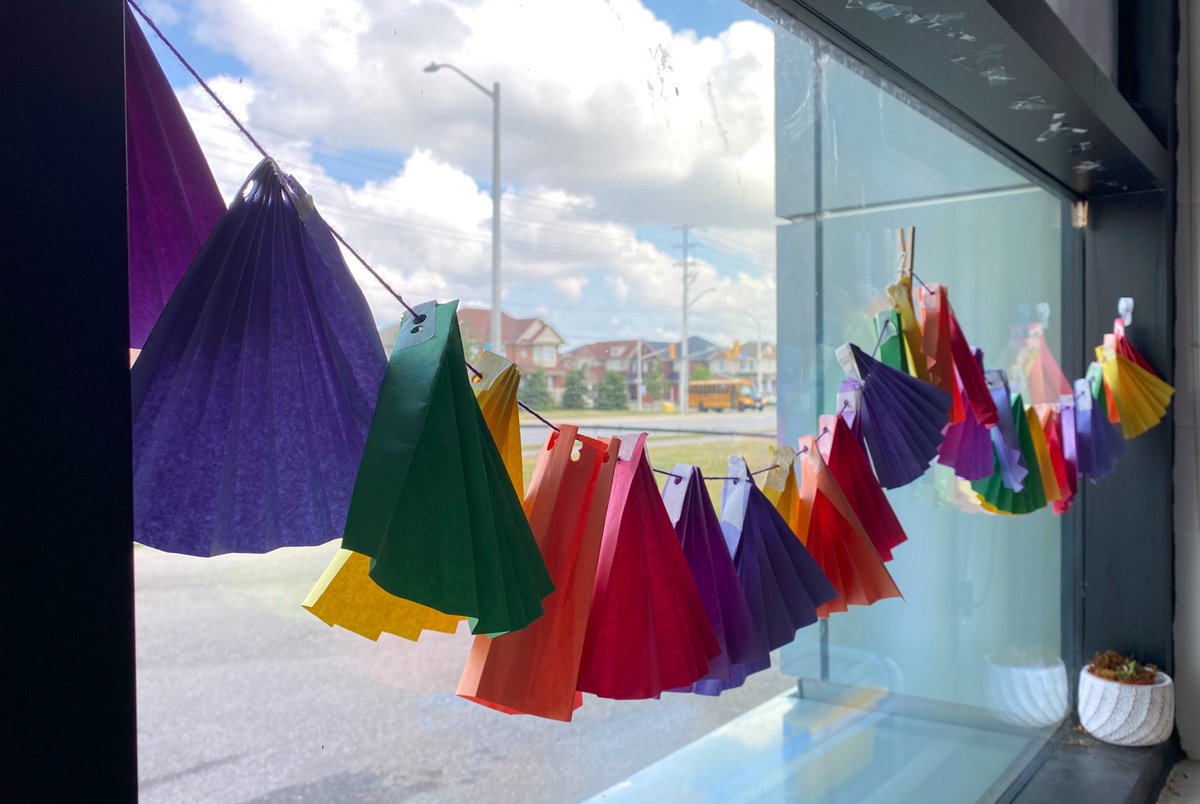 Our students have become very interested in paper folding activities, especially creating their own paper fans. With this interest in mind, we invited students in our class create fans in the colours of the rainbow, co-creating this garland for our windowsill 🌈