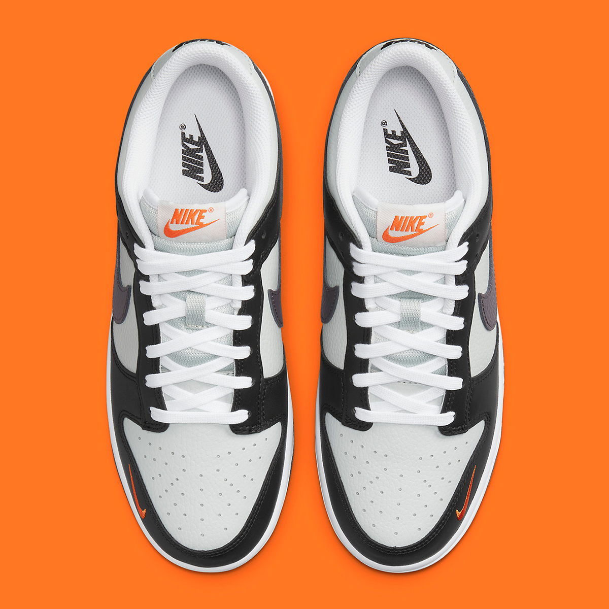 houseofheat's tweet photo. Nike Adds Orange Mini Swooshes to This New Dunk Low 🐼

SEE MORE: https://t.co/FiiQ5Vnrcl https://t.co/LPOCTxvS4G