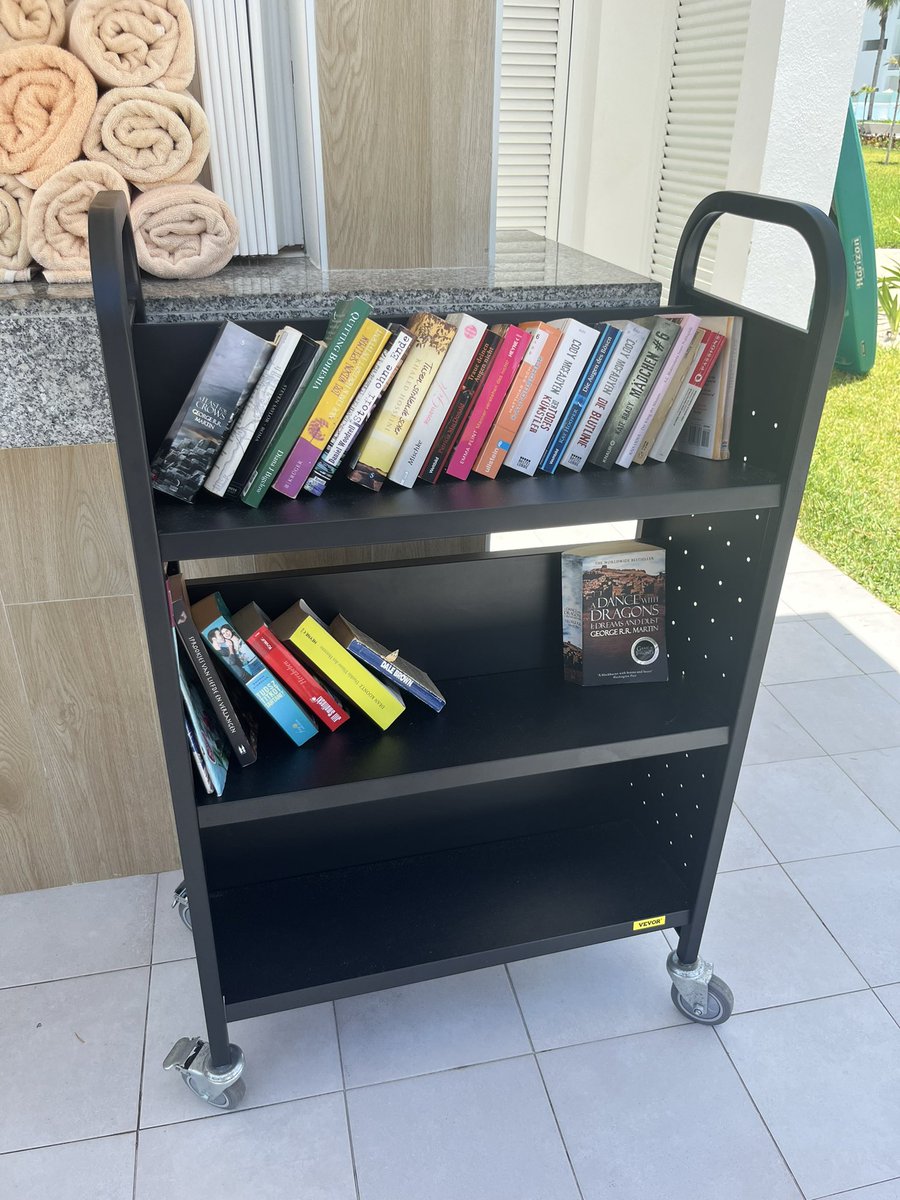 I’m on vacation and this little free library is making my librarian heart sing!